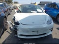 2021 Tesla Model 3 — photo 13 of 24 | VIN 5YJ3E1EA7MF976919