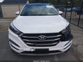 2018 Hyundai Tucson — photo 12 of 16 | VIN KM8J3CA24JU725619