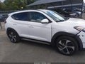 2018 Hyundai Tucson — photo 13 of 16 | VIN KM8J3CA24JU725619