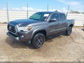 2021 Toyota Tacoma — photo 2 of 16 | VIN 5TFAZ5CNXMX099132