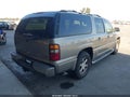 2002 GMC Yukon XL — photo 4 of 16 | VIN 1GKFK66U52J261935