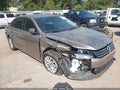 2015 Volkswagen Passat — photo 1 of 13 | VIN 1VWAS7A34FC043857
