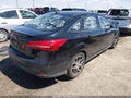 2018 Ford Focus — photo 4 of 17 | VIN 1FADP3H23JL311108