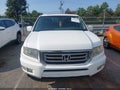 2013 Honda Ridgeline — photo 11 of 16 | VIN 5FPYK1F56DB012576