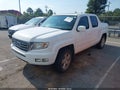 2013 Honda Ridgeline — photo 2 of 16 | VIN 5FPYK1F56DB012576