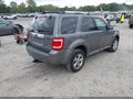 2009 Ford Escape — photo 4 of 17 | VIN 1FMCU94769KD07893