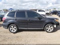 2014 Subaru Forester — photo 13 of 18 | VIN JF2SJADC1EH402894