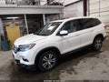 2016 Honda Pilot — photo 2 of 16 | VIN 5FNYF5H58GB014299