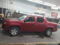 2006 Honda Ridgeline — photo 14 of 16 | VIN 2HJYK16286H558142