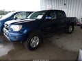 2015 Toyota Tacoma — photo 2 of 17 | VIN 3TMJU4GN0FM181494