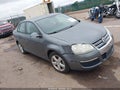 2009 Volkswagen Jetta — photo 1 of 11 | VIN 3VWJM71K49M130694