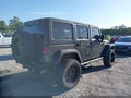 2017 Jeep Wrangler Unlimited — photo 4 of 16 | VIN 1C4HJWDG4HL572127