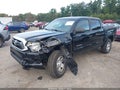 2015 Toyota Tacoma — photo 2 of 18 | VIN 5TFLU4EN1FX119561