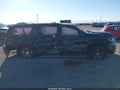 2016 Chevrolet Suburban — photo 13 of 16 | VIN 1GNSKHKC0GR100590