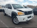 2010 Nissan Titan — photo 1 of 16 | VIN 1N6AA0EJ0AN312257