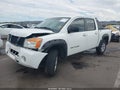 2010 Nissan Titan — photo 2 of 16 | VIN 1N6AA0EJ0AN312257