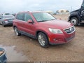 2011 Volkswagen Tiguan — photo 1 of 11 | VIN WVGAV7AX1BW001230