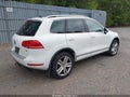 2014 Volkswagen Touareg — photo 4 of 16 | VIN WVGEF9BP2ED010981