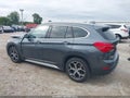 2018 BMW X1 — photo 14 of 16 | VIN WBXHT3C39J5L35055