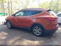 2014 Hyundai Santa Fe — photo 3 of 16 | VIN 5XYZUDLAXEG209979