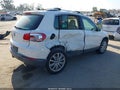 2012 Volkswagen Tiguan — photo 4 of 11 | VIN WVGAV7AX6CW599364