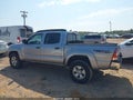2015 Toyota Tacoma — photo 14 of 16 | VIN 5TFJU4GNXFX082093
