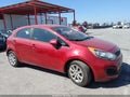 2015 Kia Rio — photo 13 of 16 | VIN KNADM5A38F6445620