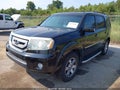 2011 Honda Pilot — photo 2 of 16 | VIN 5FNYF3H93BB052104