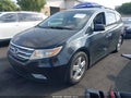 2012 Honda Odyssey — photo 2 of 21 | VIN 5FNRL5H90CB010225