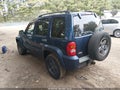 2002 Jeep Liberty — photo 3 of 11 | VIN 1J8GL58K22W231192