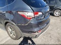2015 Hyundai Santa Fe — photo 6 of 16 | VIN 5XYZU3LB7FG270100