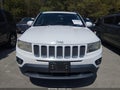 2014 Jeep Compass — photo 12 of 16 | VIN 1C4NJCEBXED660271