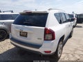 2014 Jeep Compass — photo 4 of 16 | VIN 1C4NJCEBXED660271