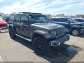 2022 Jeep Wrangler — photo 1 of 16 | VIN 1C4JJXP61NW153351