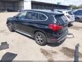 2018 BMW X1 — photo 3 of 17 | VIN WBXHT3C31J5K28355