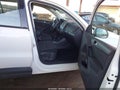 2012 Volkswagen Tiguan — photo 5 of 12 | VIN WVGAV7AX3CW602947