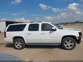 2013 Chevrolet Suburban 1500 — photo 13 of 16 | VIN 1GNSKJE79DR115011