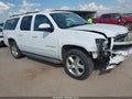 2013 Chevrolet Suburban 1500 — photo 1 of 16 | VIN 1GNSKJE79DR115011