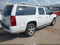 2013 Chevrolet Suburban 1500 — photo 4 of 16 | VIN 1GNSKJE79DR115011