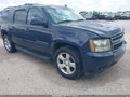 2009 Chevrolet Suburban 1500 — photo 1 of 14 | VIN 1GNFC26019J121865