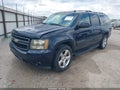2009 Chevrolet Suburban 1500 — photo 2 of 14 | VIN 1GNFC26019J121865