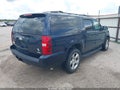 2009 Chevrolet Suburban 1500 — photo 4 of 14 | VIN 1GNFC26019J121865