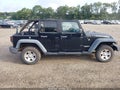 2010 Jeep Wrangler Unlimited — photo 13 of 17 | VIN 1J4HA6H17AL193175