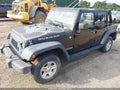 2010 Jeep Wrangler Unlimited — photo 2 of 17 | VIN 1J4HA6H17AL193175