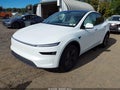 2026 Tesla Model Y — photo 2 of 10 | VIN 7SAYGDEE6TA406199