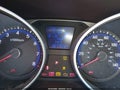 2012 Hyundai Tucson — photo 7 of 21 | VIN KM8JU3AC5CU486641