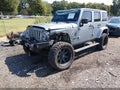 2014 Jeep Wrangler Unlimited — photo 2 of 17 | VIN 1C4HJWEG5EL240353