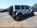 2014 Jeep Wrangler Unlimited — photo 4 of 17 | VIN 1C4HJWEG5EL240353