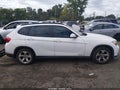 2015 BMW X1 — photo 12 of 15 | VIN WBAVM1C58FVW57158