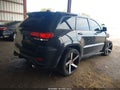 2014 Jeep Grand Cherokee — photo 4 of 17 | VIN 1C4RJFDJ4EC125955